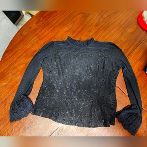 Black lace long sleeve blousesheer on arms. Lined.